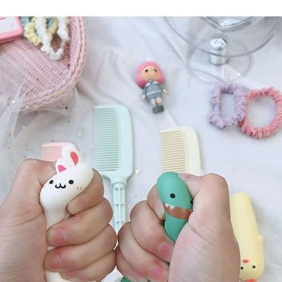 Dinosaur Comb with Squishy Stress Handle - Picture 2 of 9